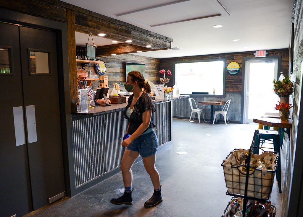 Staff member Katie Wolverton heads to the kitchen